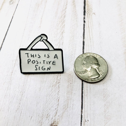This Is A Positive Sign Enamel Pin by Sierra and Pine
