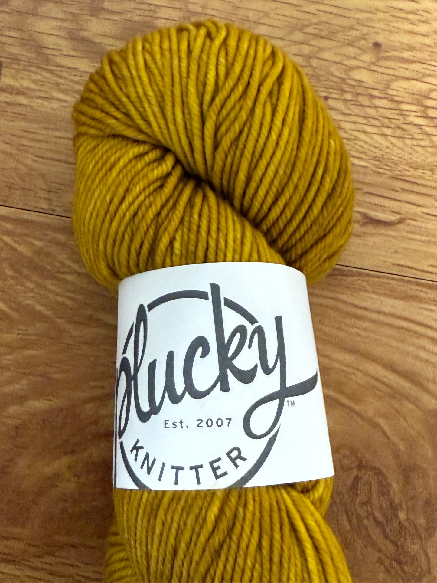DESTASH: 1 skein of The Plucky Knitter Sweater Aran in colorway Triple Crown