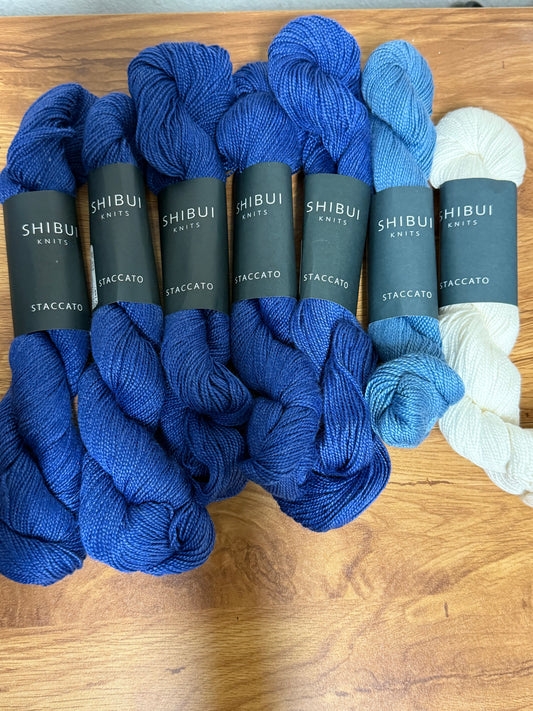 DESTASH: 7 skeins of Shibui Knits Staccato in colorway Blueprint (5x royal blue), Shore (1x light blue), and White (1x)