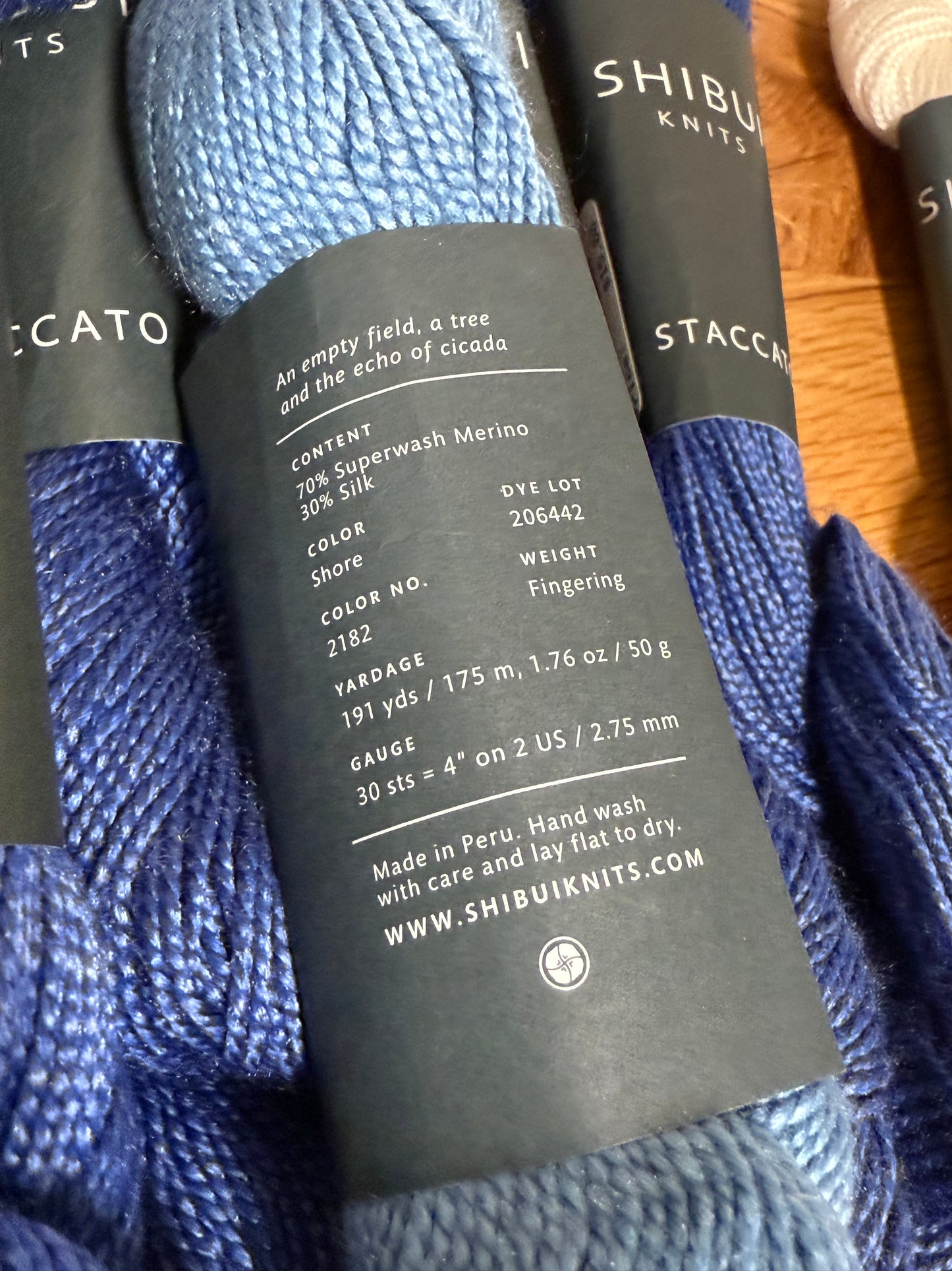 DESTASH: 7 skeins of Shibui Knits Staccato in colorway Blueprint (5x royal blue), Shore (1x light blue), and White (1x)
