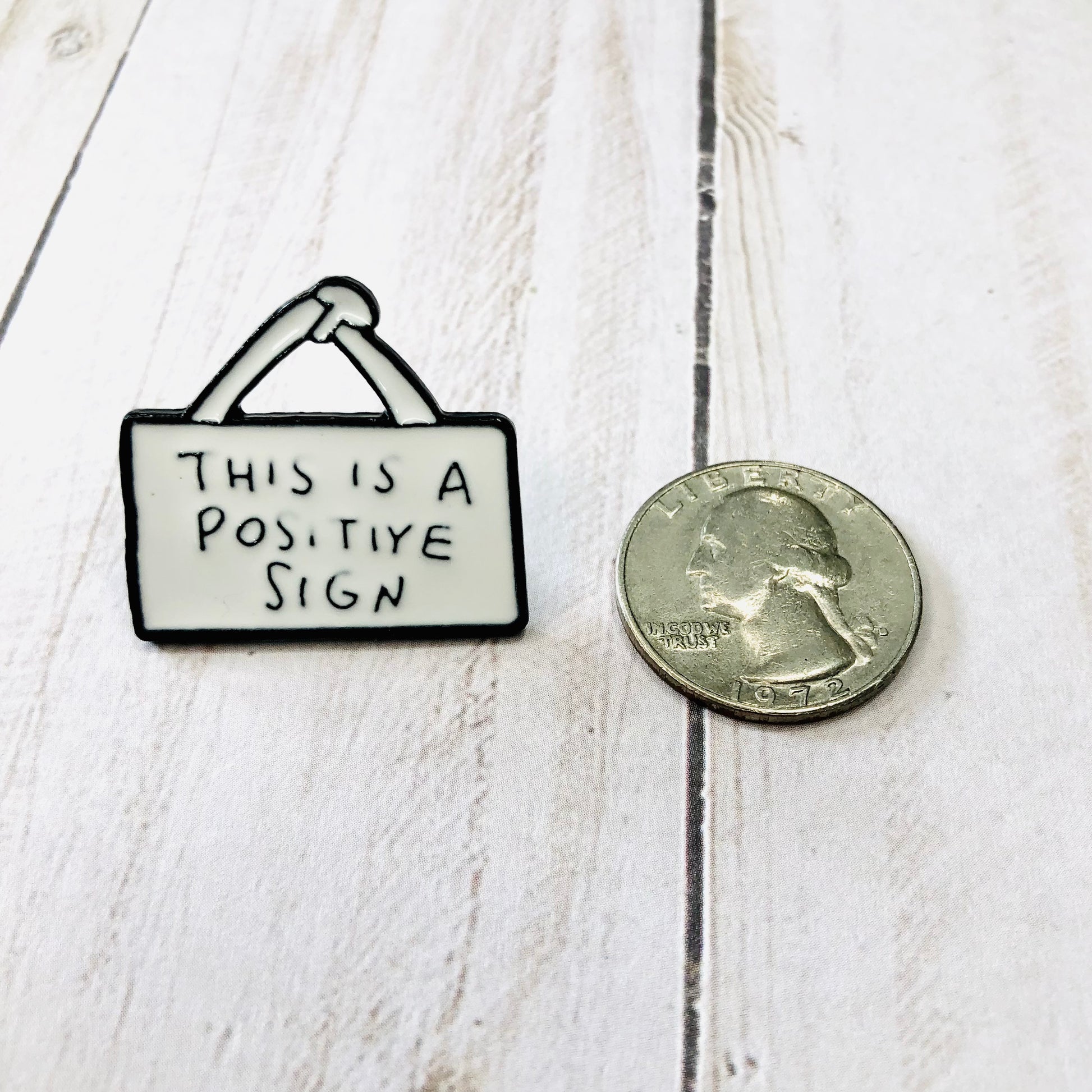 This Is A Positive Sign Enamel Pin by Sierra and Pine