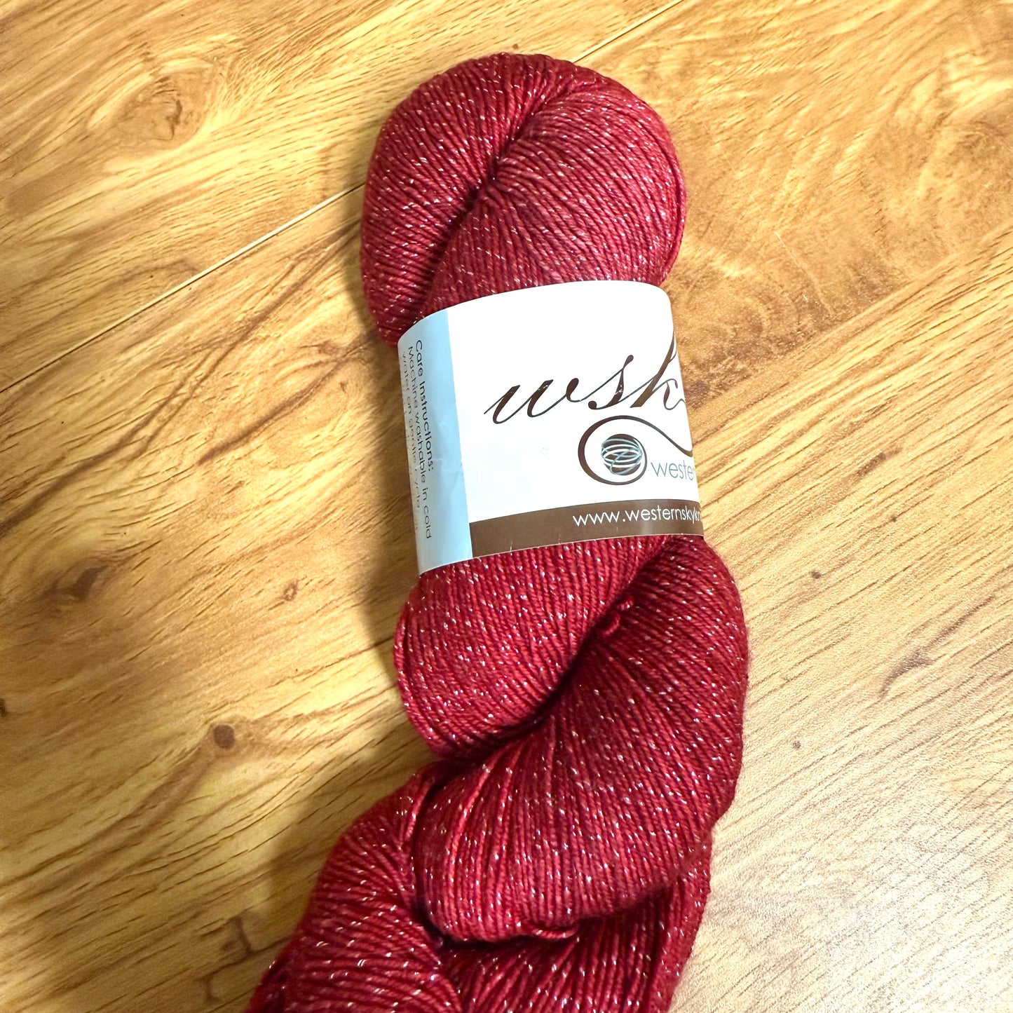 Western Sky Knits Sparkle Fingering in rustic Red